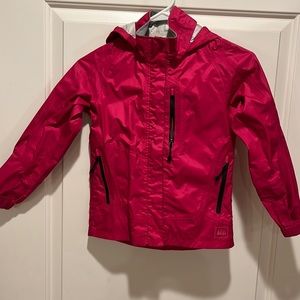 REI girls pink gently worn fully waterproof and wind proof CO-OP kids jacket.
